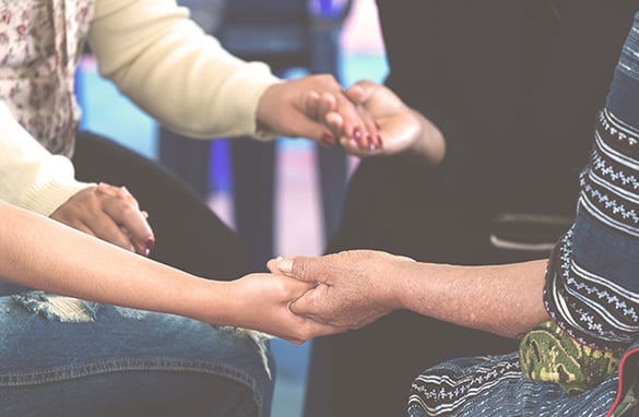 People Holding Hands In Prayer | Pure Flix