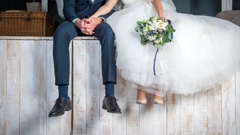 Wedding Couple Holding Hands