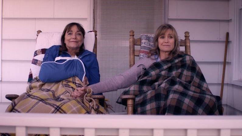charley-and-mother-on-porch-holding-hands