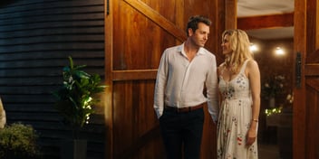 couple walking outside barn romance at the vineyard