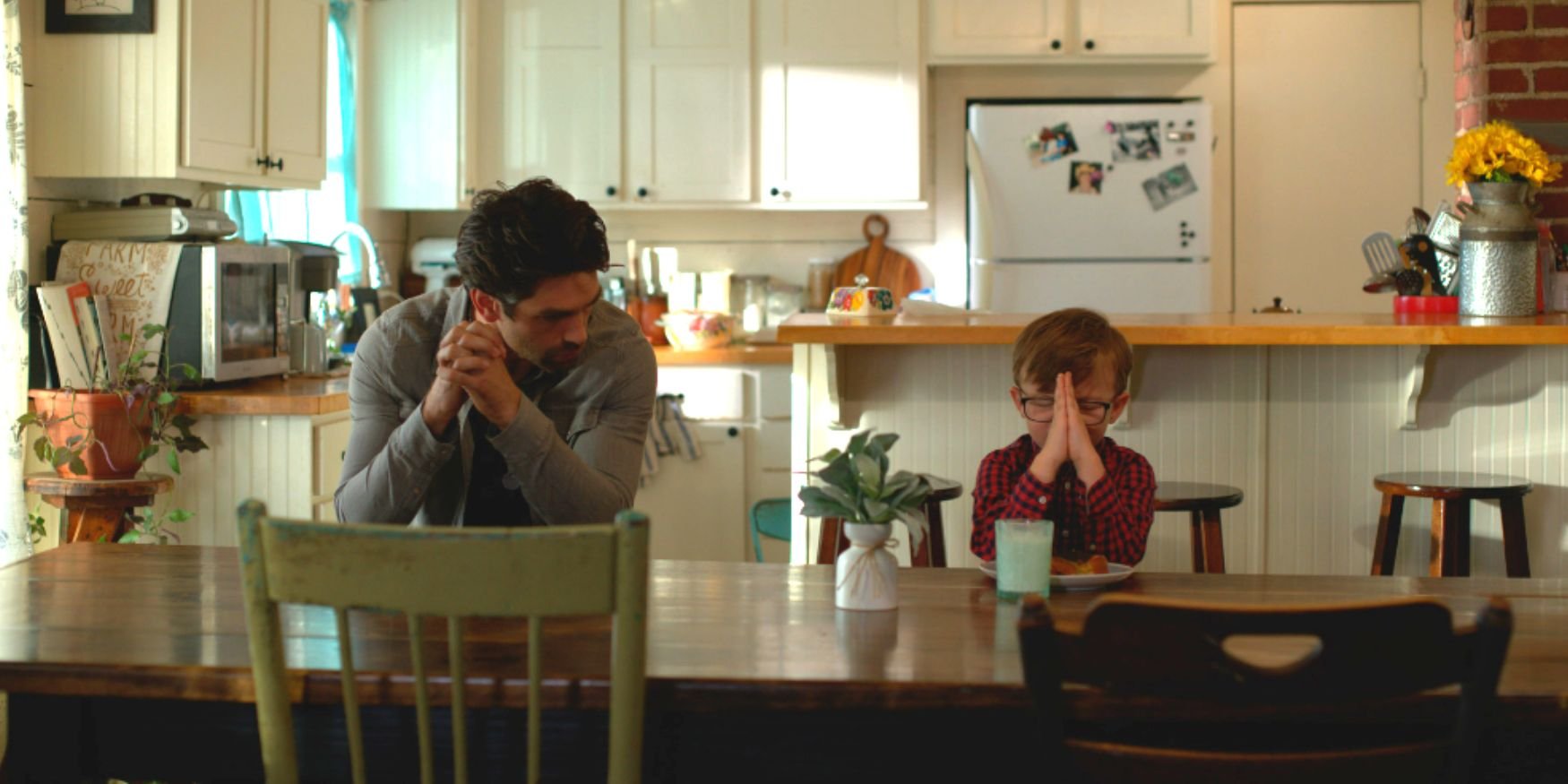 father-and-son-praying-table-gods-country-song