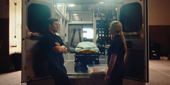 tim and dani in front of ambulance