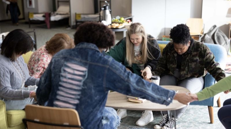 women-praying-on-set-of-divine-influencer-1