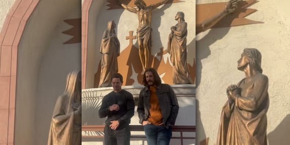 mark wahlberg and jonathan roumie outside church