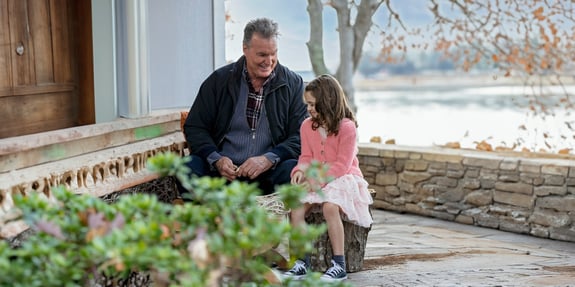 grandfather and granddaugther praying together an unlikely angel