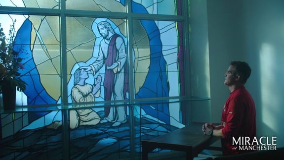 dad praying miracle at manchester pure flix blog header