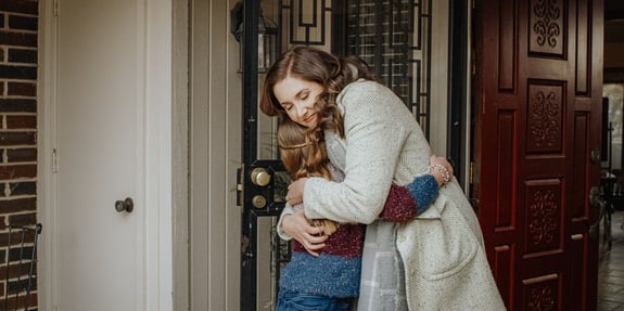 mother hugging child god's not dead: we the people pure flix blog header