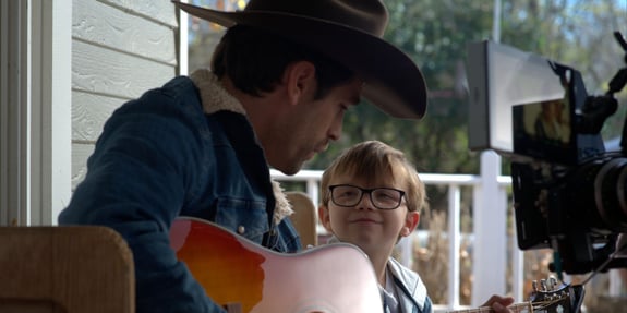 justin gaston with son musician god's country song