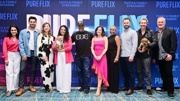 pure flix actors and stars with puppies at national religious broadcasters convention