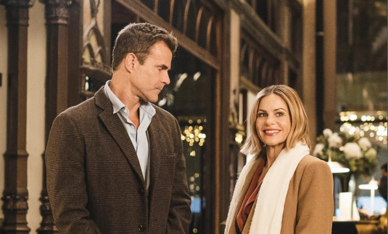 Cameron and Candace in a Great American Christmas movie scene