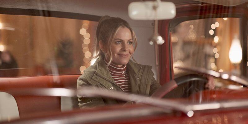 candace cameron bure in red truck a christmas less traveled